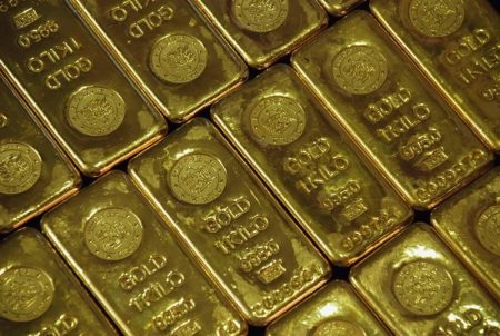 Gold prices pulled off record high as dollar recovers amid inflation watch