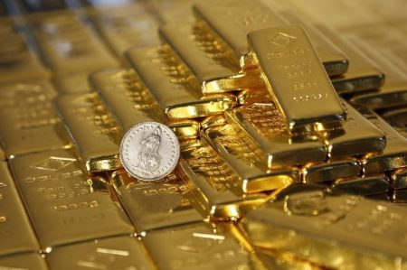 Gold prices edge lower but keep record highs in sight ahead of inflation test